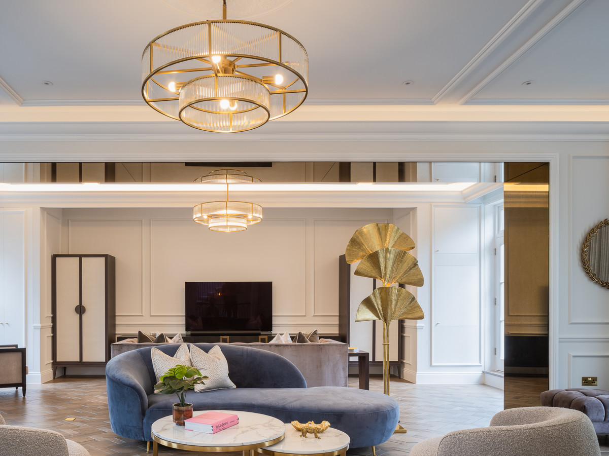 Completed residential reception rooms with decorative ceilings, wall panelling and timber flooring